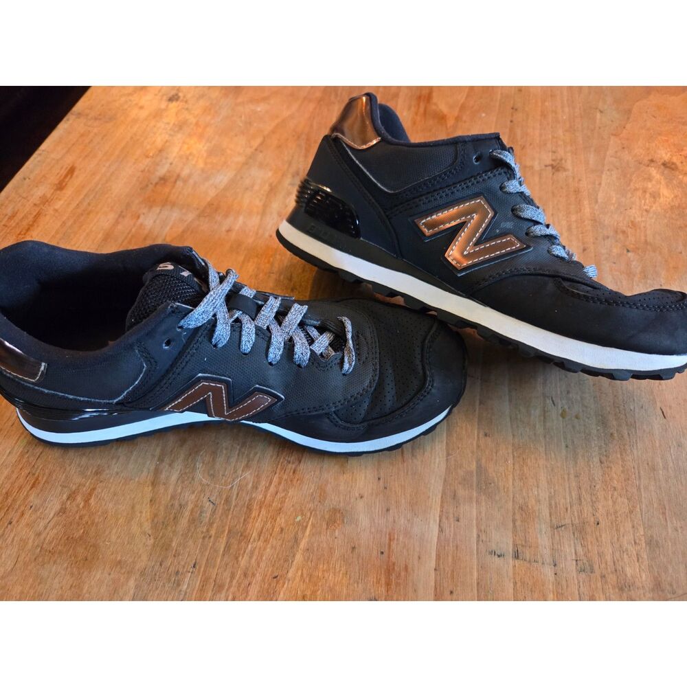 New Balance Black and Bronze women's size 6.5 #WL574VJC